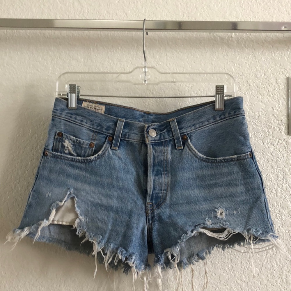 Levi’s 501 destroyed light wash high rise short. Size 26.